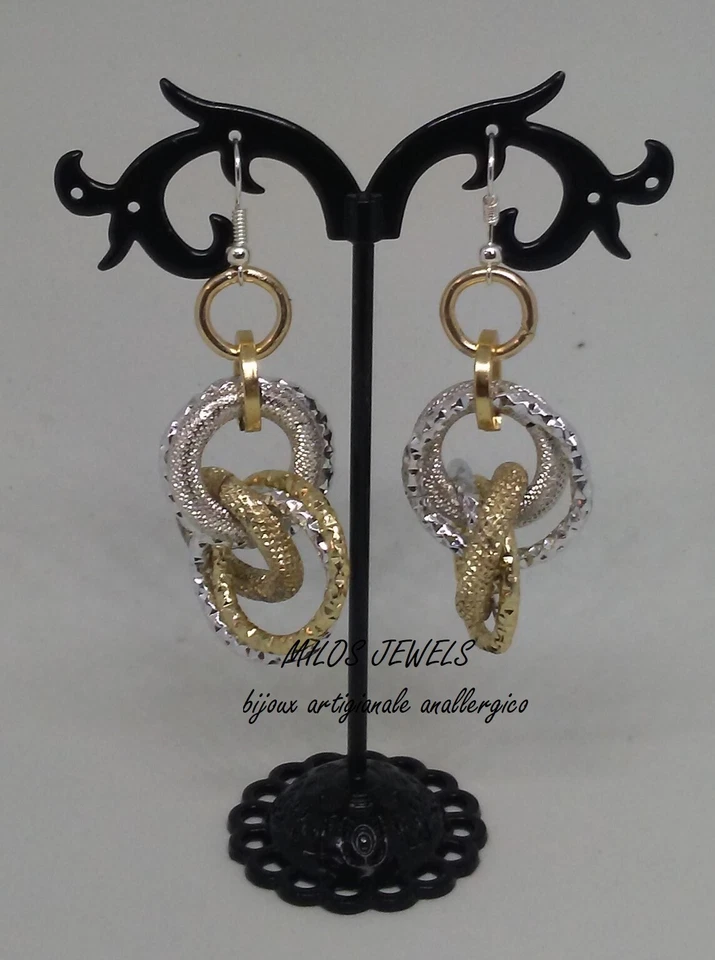 orecchini in alluminio color argento ed oro  - Immagine 1 di 1