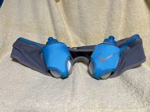 Cinturón reflectante para correr Nike con botellas de agua botellas de color verde azulado sin usar - Imagen 1 de 5
