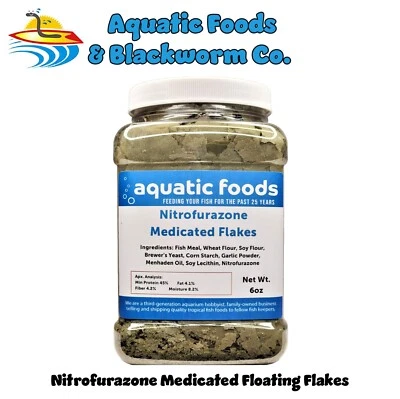 Copos de pescado medicados con nitrofurazona, hechos en EE. UU. Foto 1 de 2