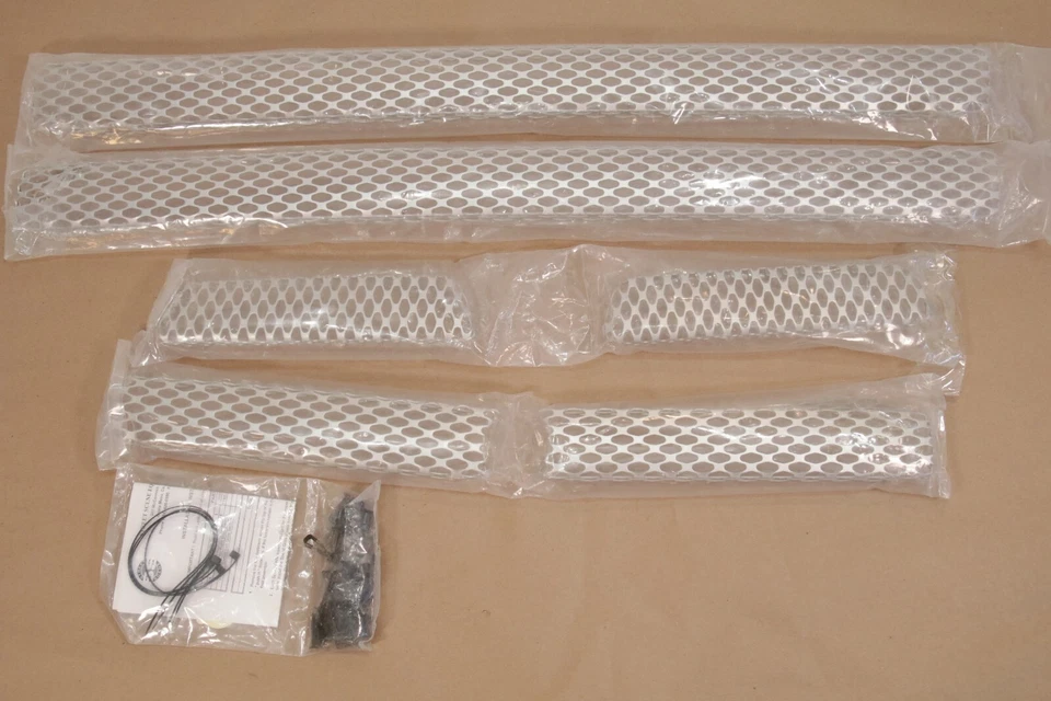 Parrilla principal inserciones velocidad Ford F-150 Excursion 950-77760 6 piezas 95077760 Foto 1 de 4