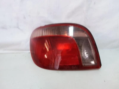 TOYOTA ECHO LEFT TAILLIGHT NCP#, HATCH, LENS# 52-004, 10/99-09/02 99 00 01 02 - image 1 of 2