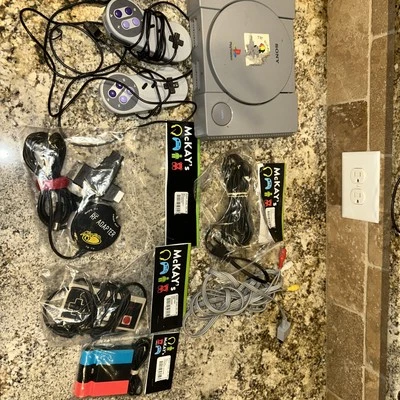 VINTAGE NINTENDO AND SONY PLAYSTATION  LOT ( USED  ) - Image 1 of 4