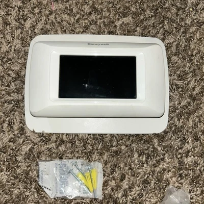 Honeywell thx9421r5005  Prestige IAQ Thermostat Touchscreen wall plate screws  - Image 1 of 4
