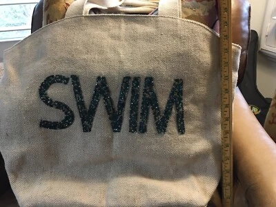 Bolso de playa con brillo SWIM $30 Foto 1 de 4