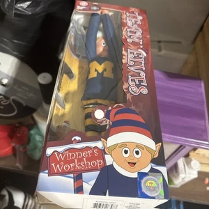 NEU IM KARTON UNIVERSITY OF MICHIGAN WOLVERINE ELF TEAM ELFEN VERSAND SCHNELL BLAU!! - Bild 1 von 2