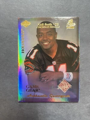 1999 Edge First Place Rookie Game Gear HoloGold Football Card #RG3 Akili Smith - Image 1 of 2