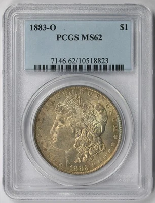 Dólar Morgan 1883-O $1 como nuevo 62 PCGS tonificado Foto 1 de 4