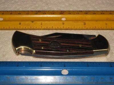 Lot K, vintage knife, Buck 112 anvil stamp, 100-year commemorative,wood handles - Image 1 of 4