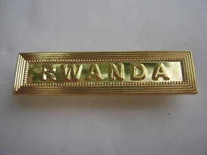 POUR MEDAILLE AGRAFE EN FER ( RWANDA ) - Picture 1 of 2
