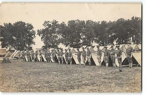 c1910 Real Photo Postcard MEN IN UNIFORM (Soldiers?) TENTS, RIFLE STACKS - RPPC - Bild 1 von 2