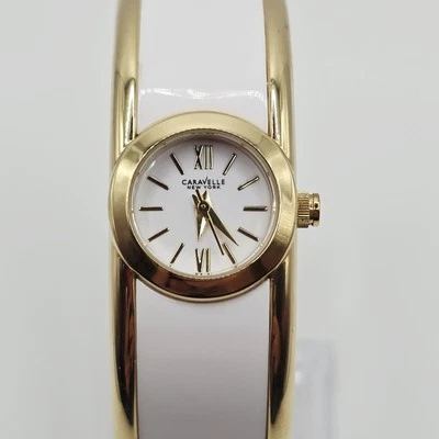 RELOJ ANALÓGICO CARAVELLE NEW YORK 44L144 MUJER TONO DORADO BRAZALETE BLANCO Foto 1 de 4