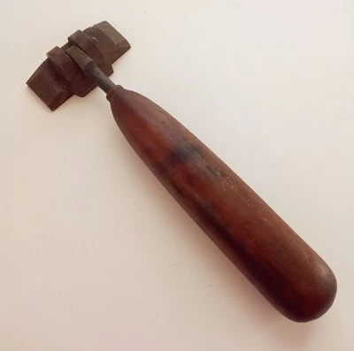 PRIMITIVE IRON AND WOOD TOOL WITH MOVABLE HEAD - Image 1 of 3
