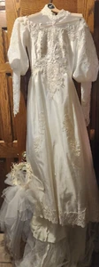 Robe de mariée manches longues taille 8 avec train et voile - Photo 1/14