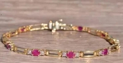 Brazalete de tenis para mujer con zafiro rosa creado en laboratorio de corte ovalado enchapado en oro amarillo de 14 k 7" Foto 1 de 4