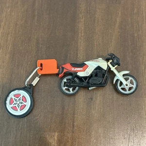 Kidco Burnin Key 1980 mit Suzuki Turbo Motorrad super selten, siehe Bilder - Bild 1 von 4
