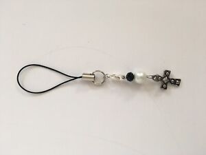 Religious silvertone cross phone charm, Comes with two black and white beads. 