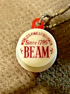 VINTAGE JIM BEAM WHISKEY KEY CHAIN COIN HOLDER - Picture 1 of 3