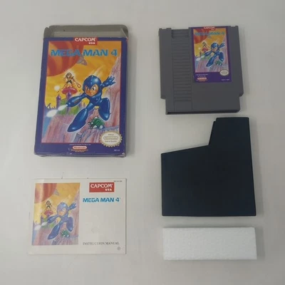 Mega Man 4 (Nintendo Entertainment System) NES Cartridge, Box, Manual, & Sleeve - Image 1 of 4