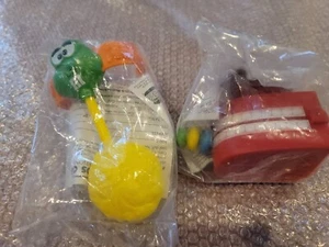 2 - 1997 Burger King M&M's Minis - secret swarm squirter & chomping teeth swarm - Picture 1 of 4