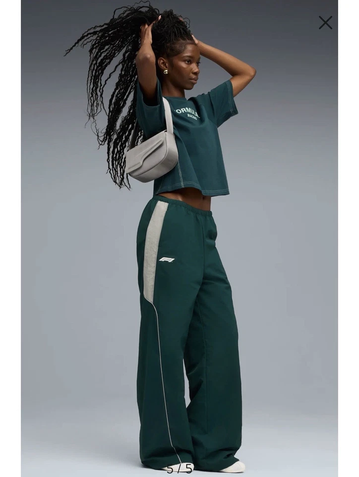 Pantalones PUMA Fórmula 1 Tejidos Nylon Pierna Ancha Verde Azulado Gris Talla M Nuevos con Etiquetas $70 Foto 1 de 4