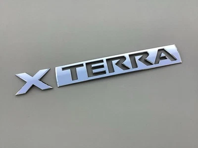 2005-2012 Nissan Xterra Tailgate Emblem Rear Nameplate Badge OEM * - Image 1 of 4