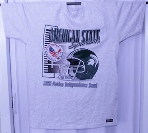 CAMISETA JANSPORT MICHIGAN STATE SPARTANS 1995 INDEPENDENCE BOWL M CON ETIQUETAS - Imagen 1 de 4