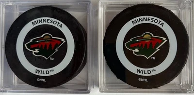 (2) MINNESOTA WILD 2000 & REG NHL OFICIAL JUEGO DISCOS INGLASCO - GARY M. BETTMAN Foto 1 de 4