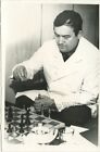 Man playing chess vintage photo