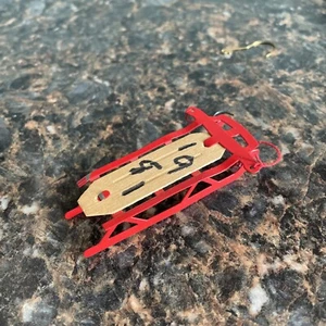 Red Vintage Metal Sleigh Christmas Ornament labeled 1981 - Picture 1 of 1