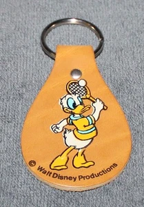 BONITO LLAVERO DE COLECCIÓN DISNEY DONALD PATO TENISTA CUERO LLAVERO DE LOTE ANTIGUO - Imagen 1 de 1