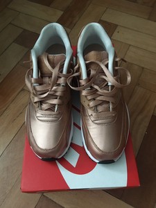 womens nike trainers with gold tick