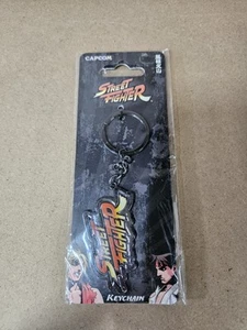 Nuovo portachiavi STREET FIGHTER METALLO Capcom Retro Gaming Arcade Smalto Portachiavi - Foto 1 di 4