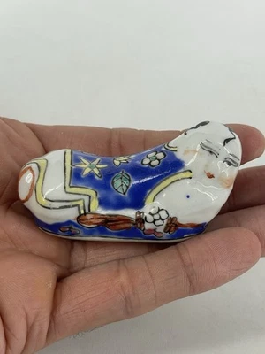 Chinese Porcelain Enamel Laying Child On Opium Pillow Figure Holder - Image 1 of 4