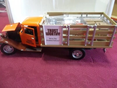 TRUSTWORTHY HARDWARE STORE 1934 FORD STAKE BED TRUCK CROWN PREMIUMS DIECAST 1:24 - Image 1 of 4