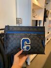 NWT  Coach X Peanuts Carryall Pouch In Signature Canvas With Snoopy