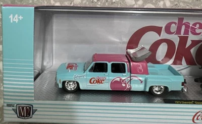 M2 Machines Cherry Coke Hauler 1973 Cheyenne & 1985 Chevrolet Camaro IROC-Z  - Image 1 of 4