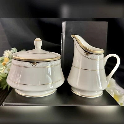 Rollos Mikasas Golden Shell crema y azúcar marfil, negro, azul y blanco - Juego de 3 piezas Foto 1 de 4