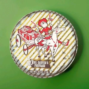 Vintage Mrs Carvers torta alla frutta Babbo Natale latta cowboy 2 libbre. Kringle Tex da collezione  - Foto 1 di 10