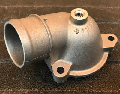 Mercedes-Benz Eng. Carcasa de termostato de refrigerante - 103-203-07-74 - para 190E y más Foto 1 de 4