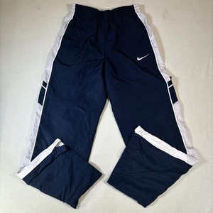 Pantalones cortavientos forrados negros blancos grandes Nike jóvenes niños con cordón - Imagen 1 de 10
