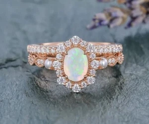 Lab Created Fire Opal 2.50Ct Oval Cut Halo Women's Bridal Ring Rose Gold Plated - Picture 1 of 8