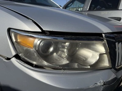 Faro delantero derecho pasajero Lincoln Zephyr sedán 3,0 L V6 tracción delantera 2006 OEM Foto 1 de 4