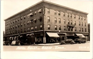 1940s RPPC Postcard Hotel Holst Cafe Boone Iowa Old Cars Beasley's Barber Shop - Picture 1 of 2