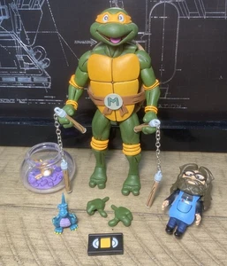 Neca MICHELANGELO VHS Pizza Club TORTUGAS NINJA MUTANTES ADOLESCENTES 2023 7 pulgadas - Imagen 1 de 8