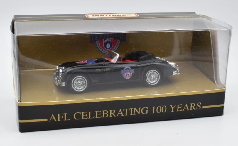 Matchbox Dinky Jaguar XK 150 nero AFL Australia 100 anni. DieCast.... - Immagine 1 di 4