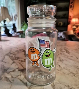 Tarro de caramelo conmemorativo de vidrio olímpico 1984 de colección M&M’s en muy buena condición - Imagen 1 de 4