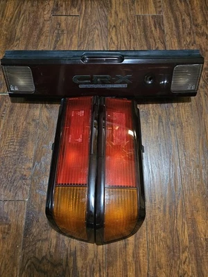 Lanterna traseira JDM Honda CRX EF7-EF8 90/91 OEM Kouki com enfeite central estilo S2 - Imagem 1 de 4