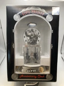 Elvis Presley Jubiläumsuhr drehbares Gitarrenpendel Porzellansockel NEU! - Bild 1 von 4