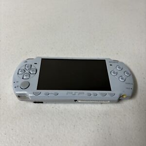 LIGHT BLUE PSP -2000 FAULTY NO BATTERY  CRACK SCREEN