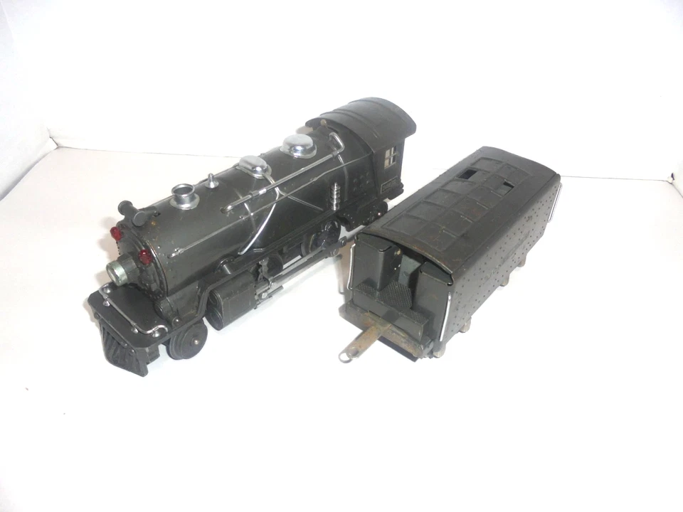 LIONEL 249E PREWAR STEAM LOCOMOTIVE WITH WHISTLE TENDER GUNMETAL O GAUGE RUNS G - Image 1 of 4